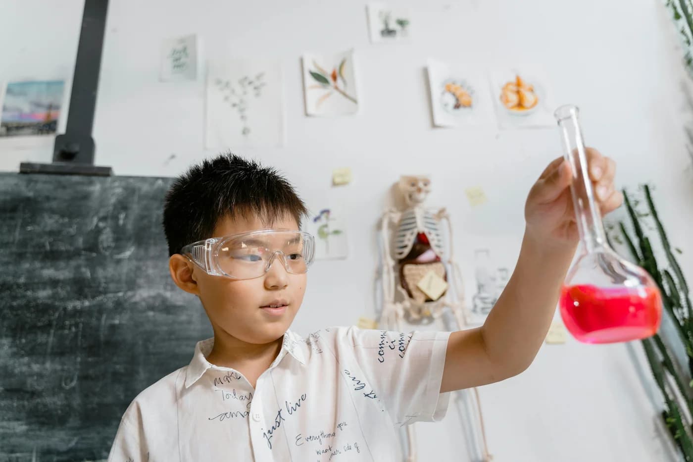 Singapore students conducting integrated science experiments in Combined Science laboratory