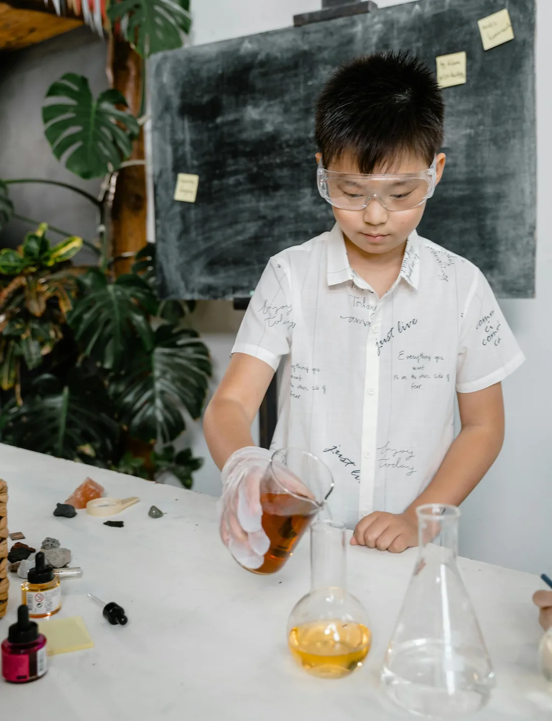 Singapore students exploring molecular motion and atomic interactions in advanced Chemistry-Physics laboratory