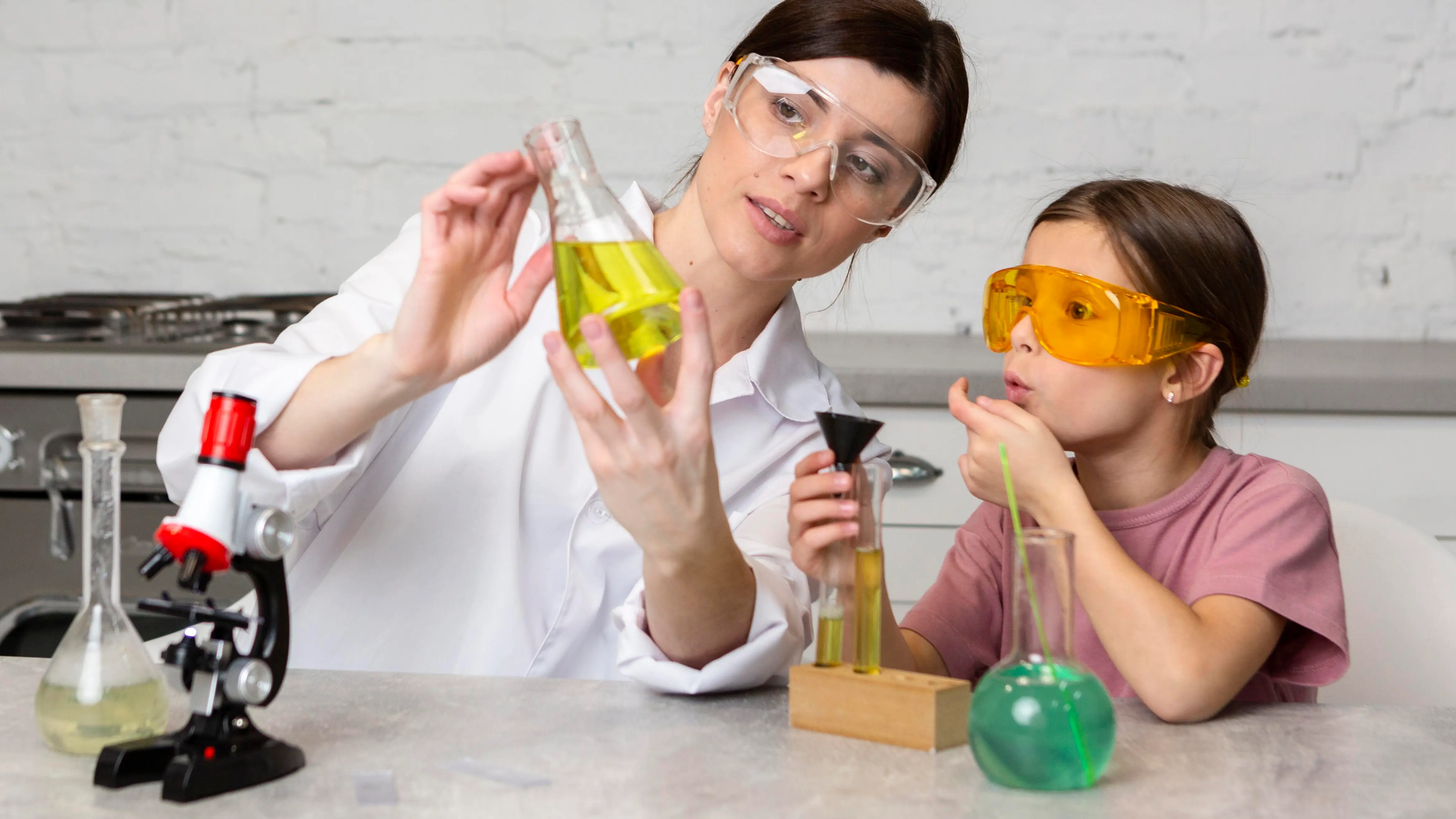 A child exploring a hands-on experiment — the concepts and process skills at the heart of PSLE Science.